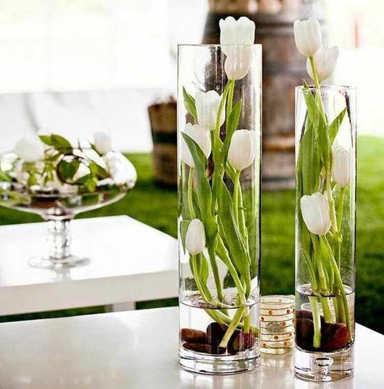 Floreros de cristal con flores